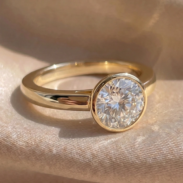 Round solitaire engagement ring